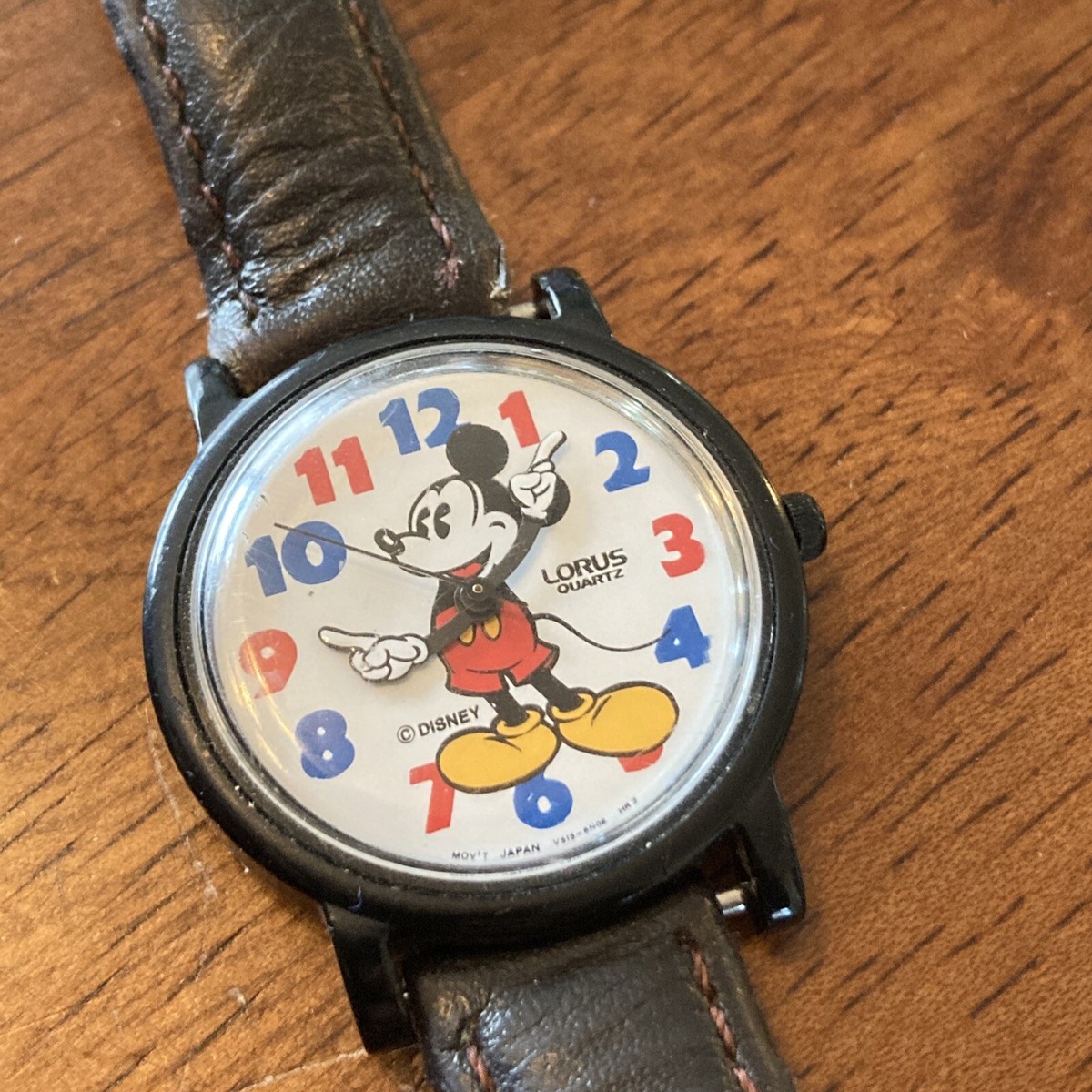 vintage Lorus Mickey Mouse watch
Works. Needs a new leather band Vintage Lorus Walt Disney Mickey Mouse Ladies Gold Tone  main image 3
