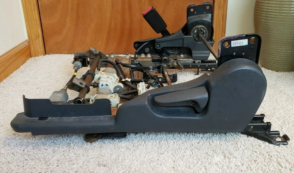 Mitsubishi Eclipse 2006 conductor delantero manual montaje eléctrico deslizadores Foto 2 de 4