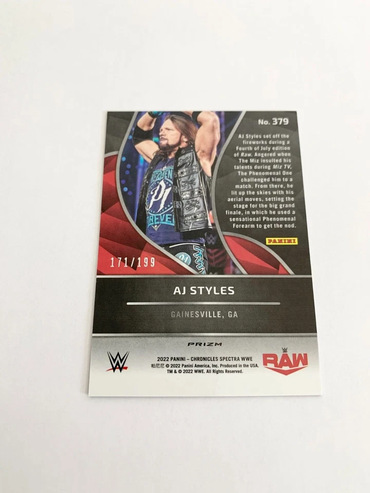 AJ Styles Red 171/199 2022 Panini Chronicles Spectra WWE # 379 - Image 2 of 2