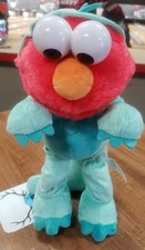 Sesame Street Elmo Dino Stomp Dancing Plush Toy Sings
