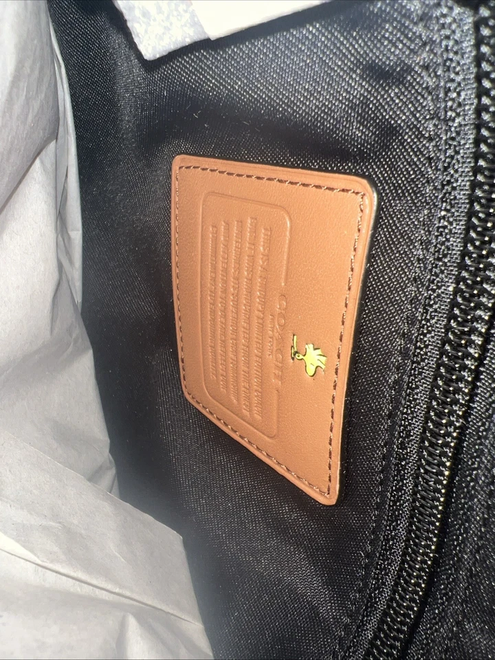 Autêntica bolsa de mão Coach Snoopy Collaboration - Imagem 2 de 4