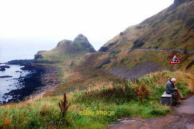 Photo 6x4 Antrim Coast - Giant's Causeway - Walker sitting on Bench  & Great St