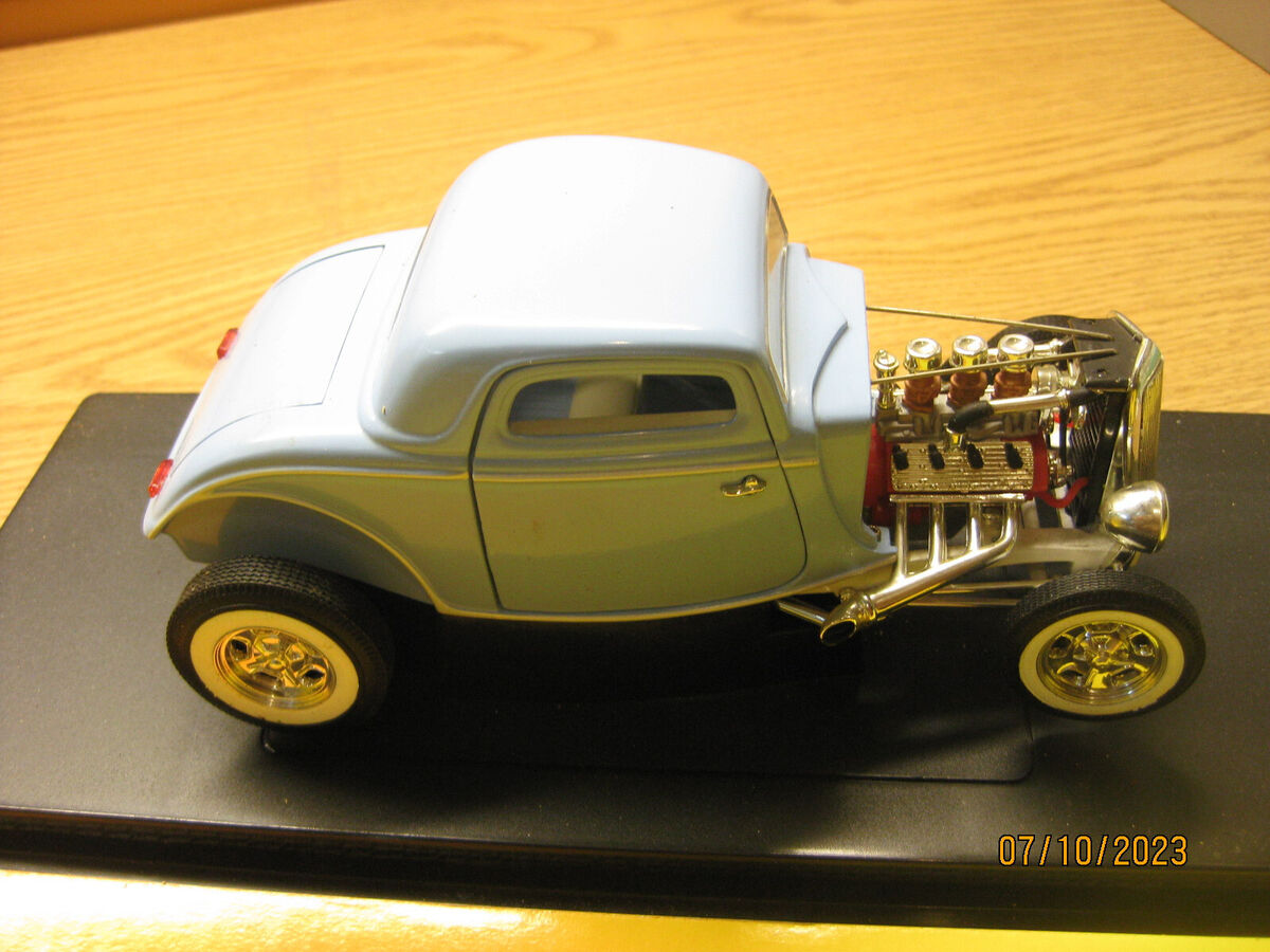 1/18 1934 FORD COUPE HOT ROD IN L.BLUE BY ERTL/AMERICAN 1/18 1934 FORD COUPE HOT ROD IN L.BLUE BY ERTL/AMERICAN