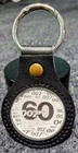 2022 James Bond 007 "60 Years of Bond"  .999 1 oz Coin In A Leather Key Ring