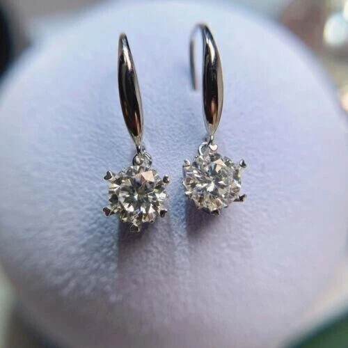Single diamond shop drop earrings