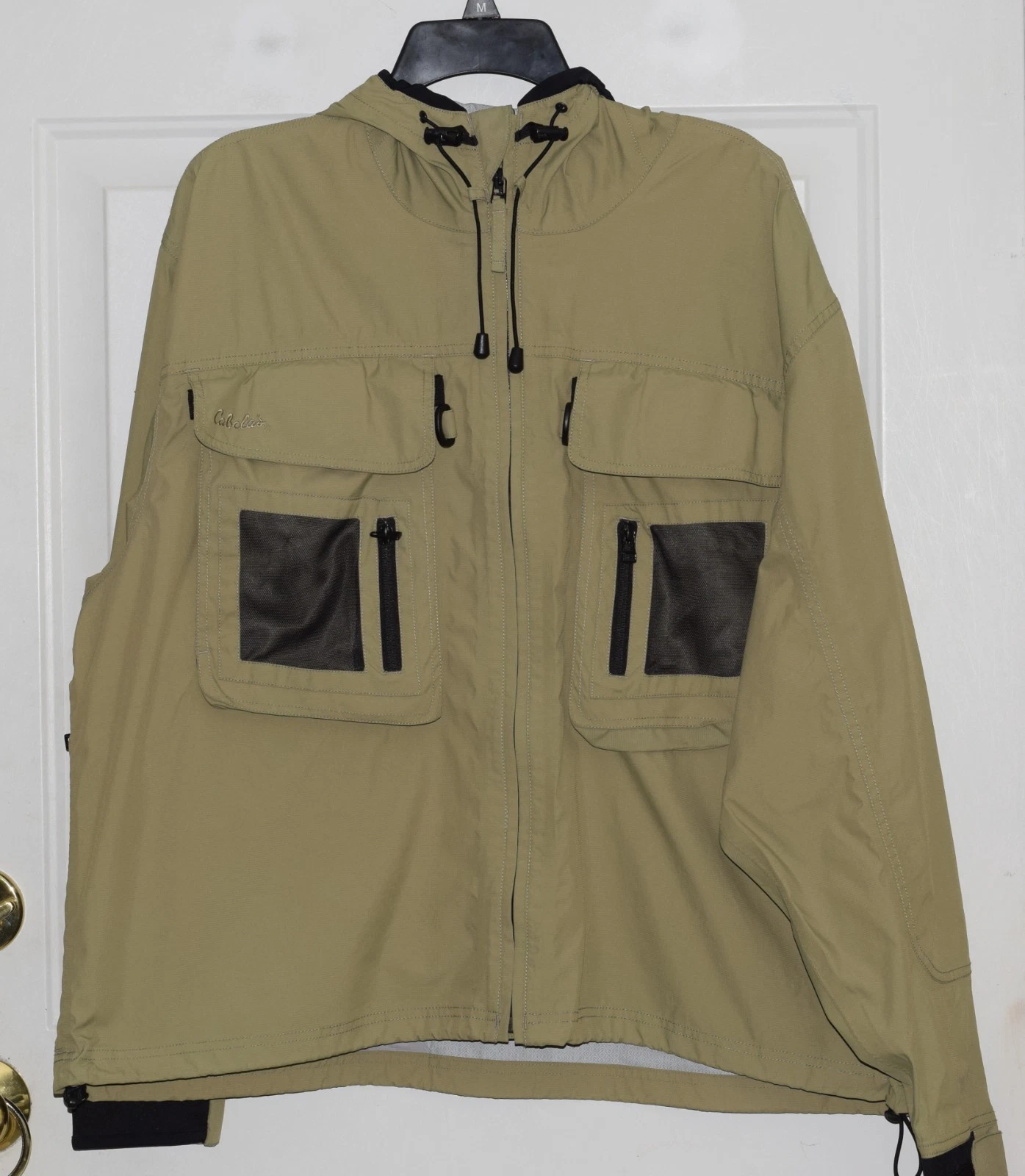 CABELAS MENS FISHING UTILITY RAIN JACKET SOFTSHELL NYLON WATERPROOF L / XL NWOT
Opens in a new windo
