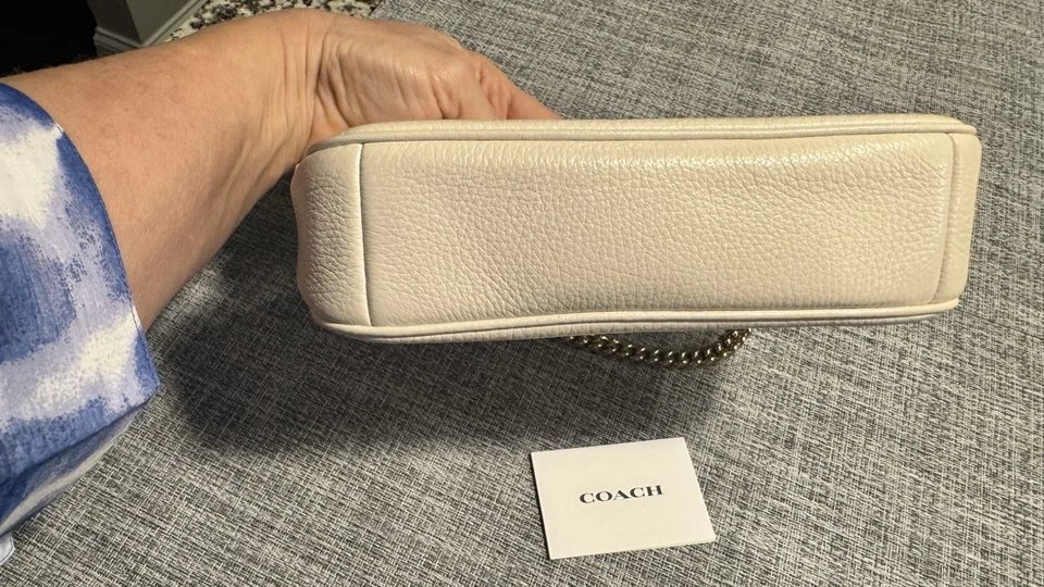 蔻驰诺丽塔腕带签名皮革金色/粉笔 — 第 2/4 张图片