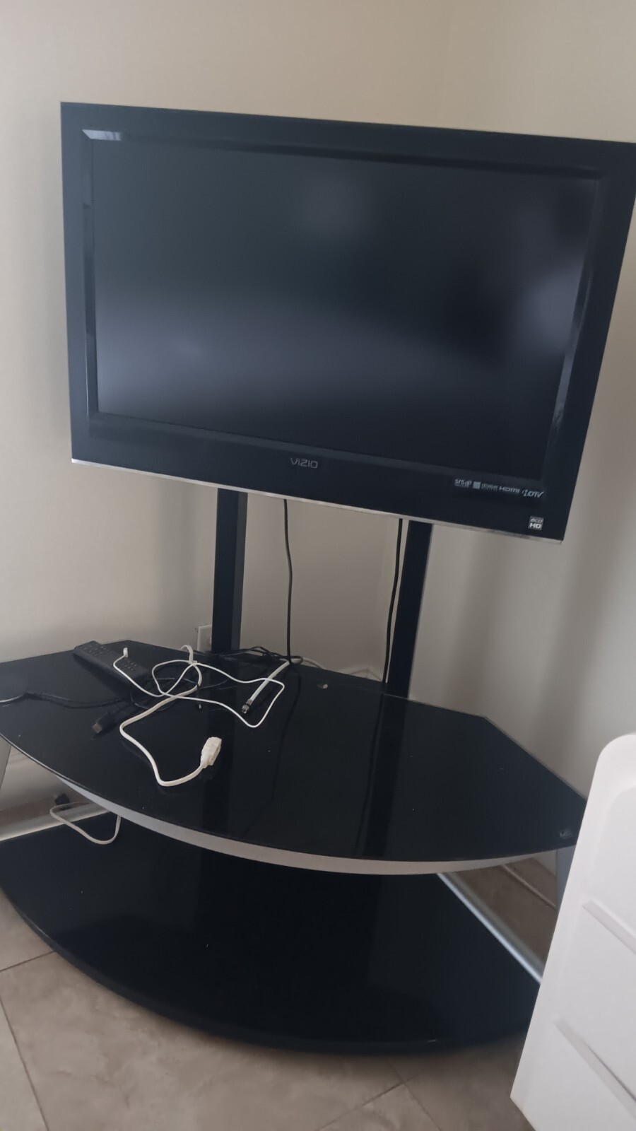 TV-Stand w/ Television.