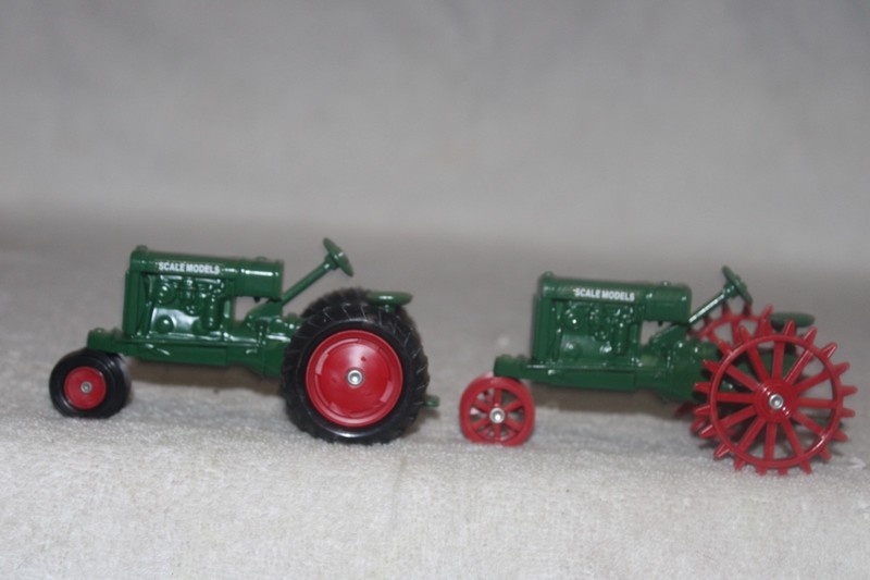 1/43 (2) OLIVER ROW CROP 80 1ST EDITION TRACTORS (ONE ON STEEL & ONE ON RUBBER)