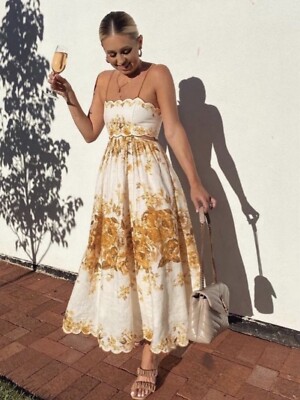 zimmermann golden pleated floral slip dress Zimmermann Alchemy Pink Paisley Structured Scarf Tie Midi Dress main image 1