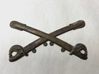 Civil War crossed swords military cap insignia