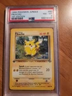Pokémon PSA 8 1999 Jungle Pikachu 1st Edition 60/64