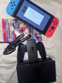 Nintendo Switch HAC-001(-01) with Blue and Red Joy-Con Controllers and Mario...