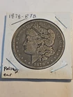 1878 Morgan Silver Dollar - 7 Tail Feathers, Rev-78 Polished Ear. ERROR/VAM