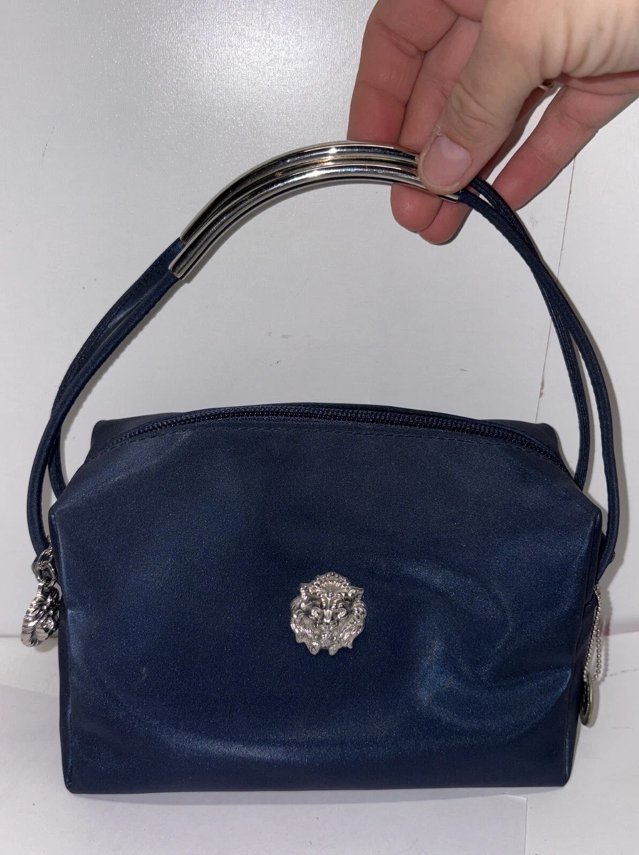 Bolsos de mano con estampado de león