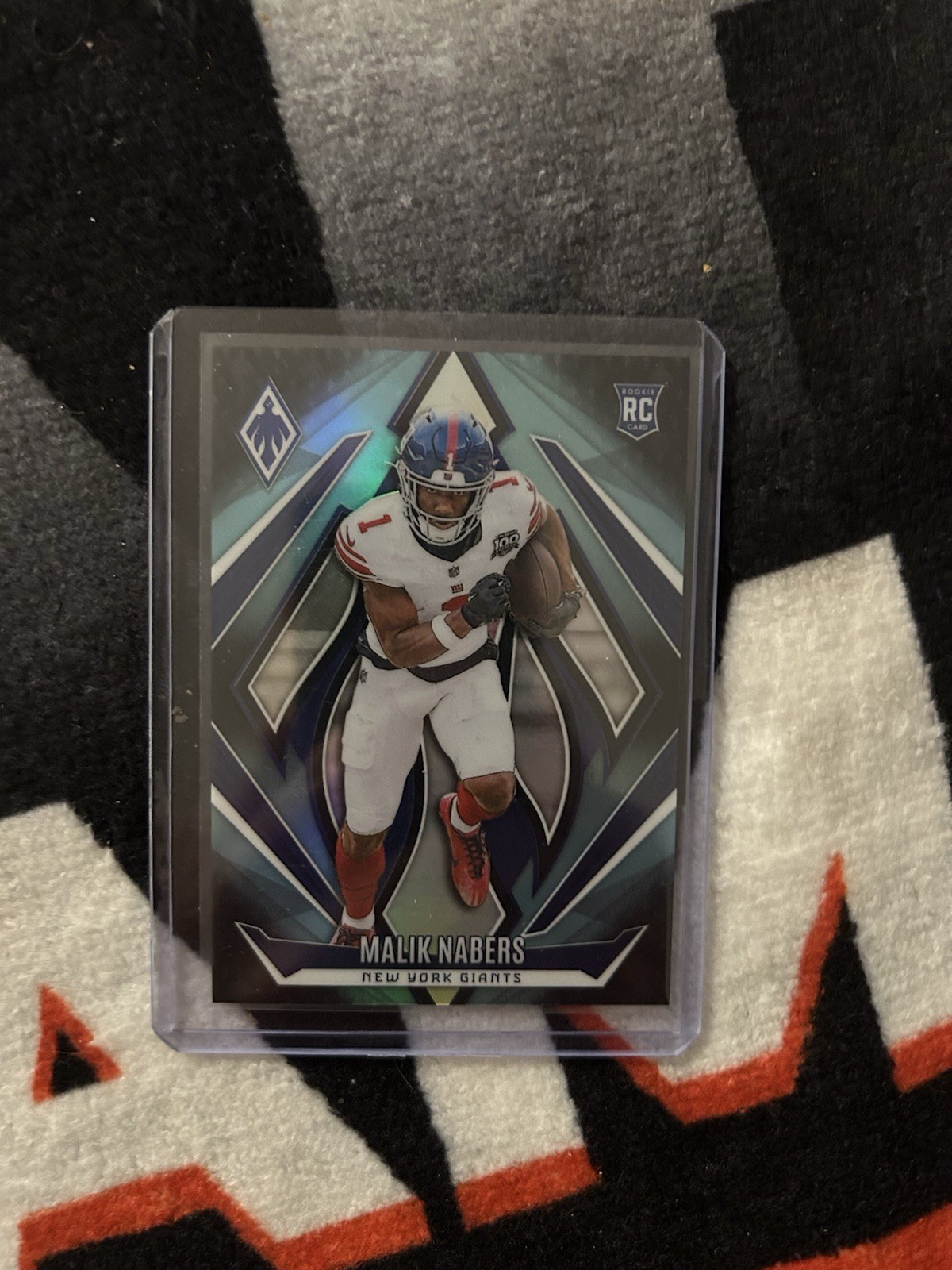 2024 Panini Phoenix - Rookies Malik Nabers #221 Teal Fade /72 (RC)