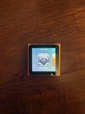 Apple iPod Nano 6th Generation Orange 8 GB bundle with charger, cases, adaptor