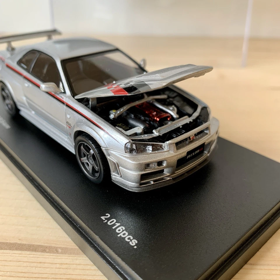 Nissan Skyline Nismo GT-R R34 S-Tune 1:43 Kyosho 03383S Silver cofano motore - Immagine 2 di 4