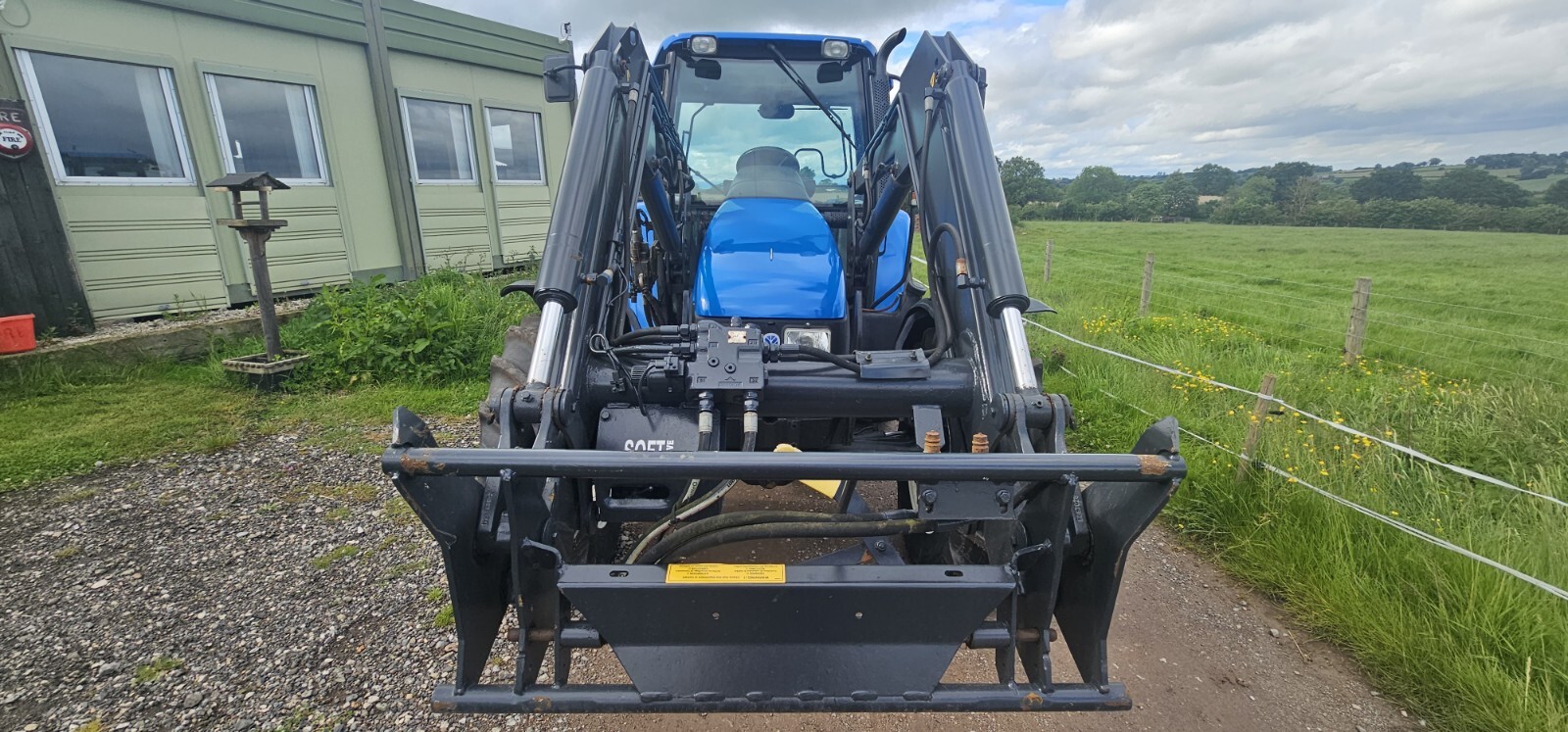 New Holland TL100 4x4 Tractor with Quicke Q750 Loader GWO eBay