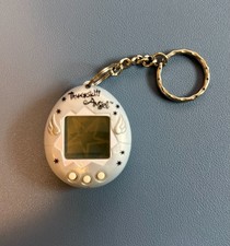 Original 1997 Angel Tamagotchi - silver wings - for parts