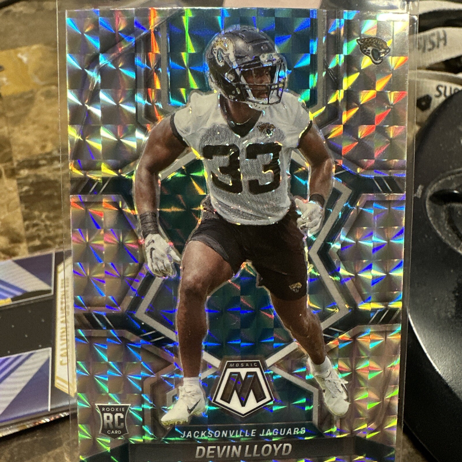 2022 Panini Mosaic Devin Lloyd RC #375 Silver Mosaic Prizm Jacksonville Jaguars