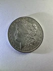 1884-O Morgan Silver Dollar Almost Uncirculated