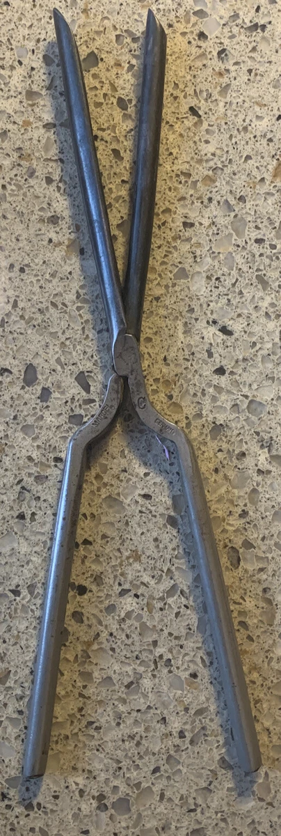 Antique curling cheap iron value