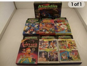 Aladdin Deck Enhancer &7 Beautiful Video GAMES For The NES Buy 3 Sets For $575.~