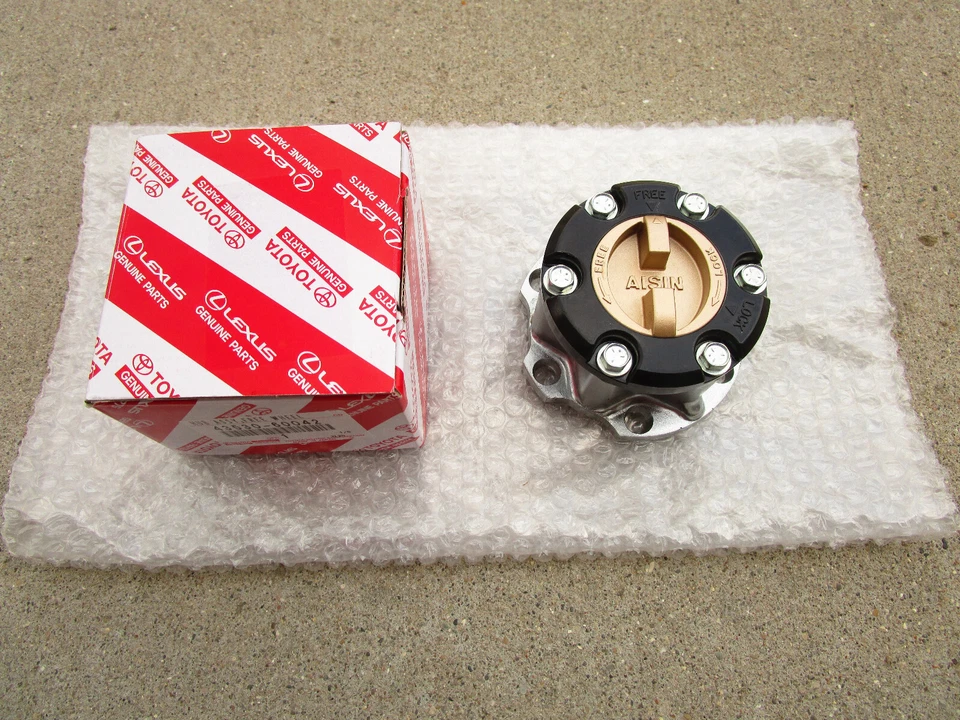 97-06 TOYOTA LAND CRUISER FZJ80 RUEDA LIBRE BUJE DE BLOQUEO MANUAL CANTIDAD 1 OEM NUEVO Foto 2 de 4