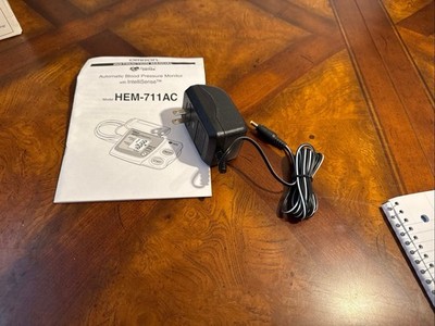 HEM-711 AC Adapter and Instruction Manual for Omron Blood Pressure Monitor Used