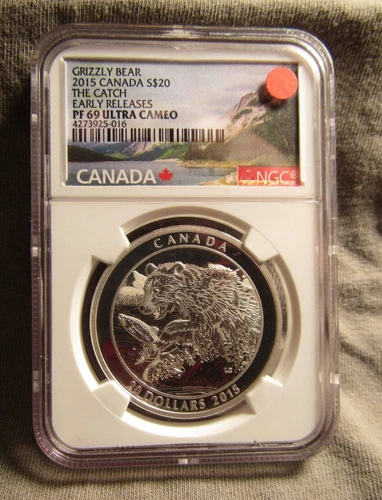 2015 CANADIAN SILVER $20 COMMEMORATIVE..GRIZZLY BEAR-THE CATCH..ER UC  NGC-69 UC