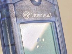 Sega Dreamcast HKT-7000 Transparent Blue VMU Visual Memory Card Unit (Powers On)