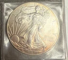 1 oz 2014 Walking Liberty American Eagle .999  SILVER DOLLAR w/slight toning