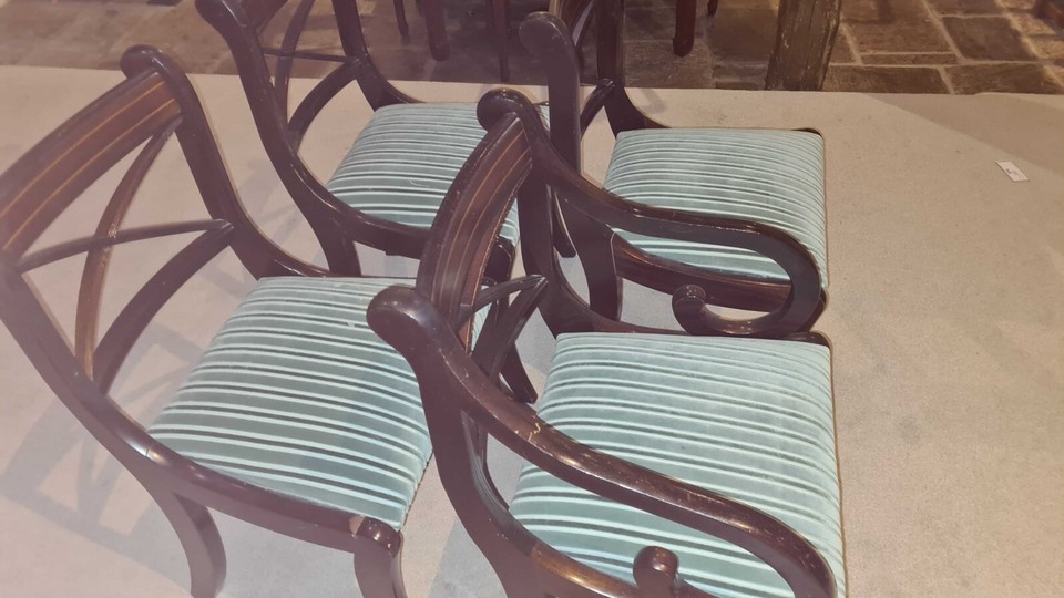 Five dark wood chairs with stripy attached cushions 2 have arms, 3 do