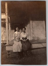 Vtg B&W Snapshot Two Women Sitting On Porch In Long Dresses & Skirts Wood Porc