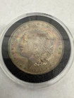 1884-O Bu Rainbow Toned Morgan Dollar
