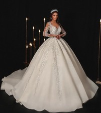 Luxurious Long Sleeved Wedding Dress with Applique Beads and Lace Bridal Gown