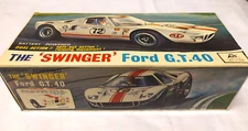 ALPS JAPANESE TIN LITHO B/O 1965 FORD G.T. 40- THE SWINGER- NEW BOXED AMAZING
