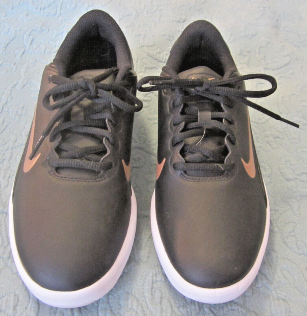 nike golf shoes gold