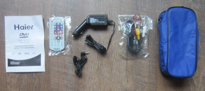 HAIER PDVD770 PORTABLE DVD PLAYER REMOTE CONTROL & Manual Car adaptor Ear buds +