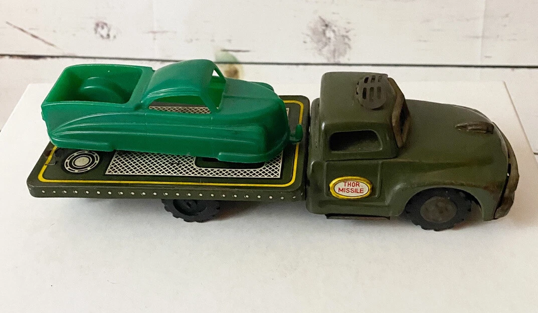 Lot of 2 Vintage Toy Trucks Thor Missile Metal Truck Ideal Plastic Truck