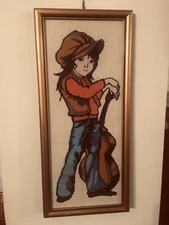 Embroidered on hand girl in a frame 19.5 in x 8,5 x 0 5