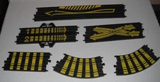 Tyco slot car track pieces  and  plastic  guard rails...used--ndr