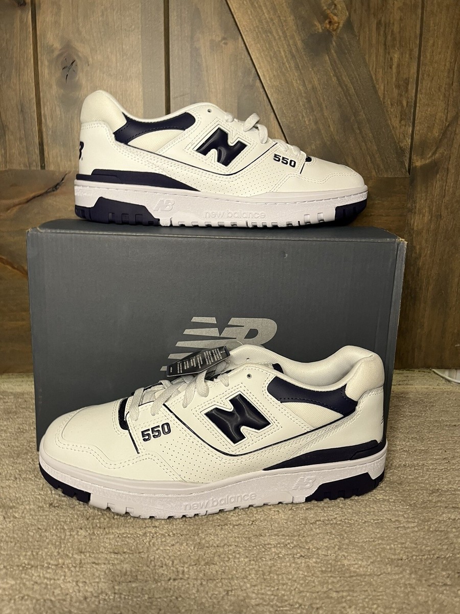 navy and white new balance 550