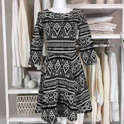 black and white aztec print trim long sleeve mini dress Black Glitter V Neck Dress main image 0