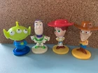 Alien, Buzz, Jessie and Woody - Pixar Toy Story Figures