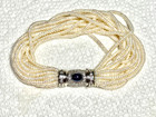 NATURAL DIAMONDS, SAPPHIRE, 14 STRAND FRESH WATER PEARL BRACELET — photo 1