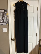 Black maxi dress with sequin details and zipper back. Size: 6 #formal