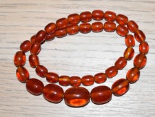 Collier Ancien En Résine Ambrée Marron - Longueur 64.5 Cm - Occasion