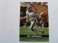1991 Pro Set John Elway - Charles Haley In-The –Grasp Rule Football Card 345